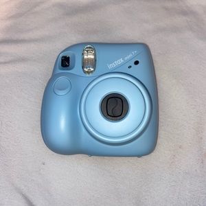 Blue Polaroid camera with case included